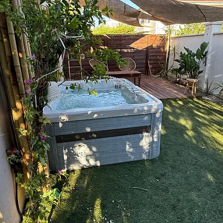 Rez De Jardin Cosy & Jacuzzi شقة
