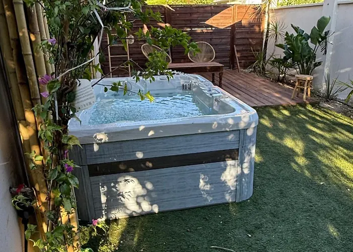 Rez De Jardin Cosy & Jacuzzi شقة